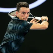 Bautista resta una pelota de revés ante Murray Bautista resta una pelota de revés ante Murray