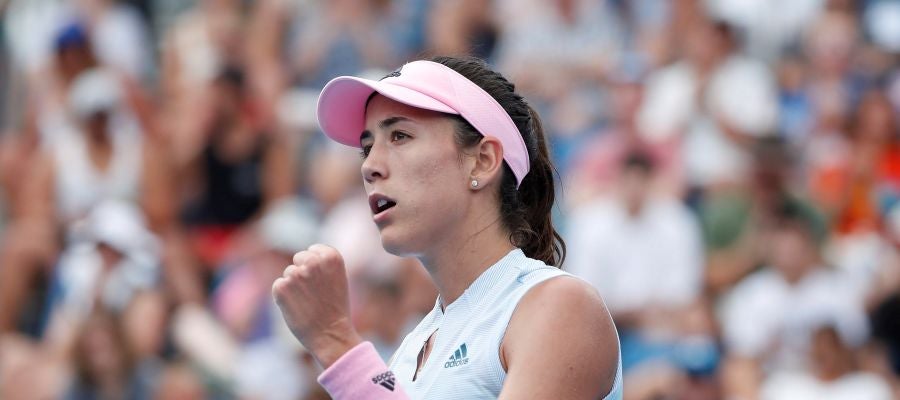 Garbiñe Muguruza celebra un punto en su estreno en el Open de Australia Garbiñe Muguruza celebra un punto en su estreno en el Open de Australia
