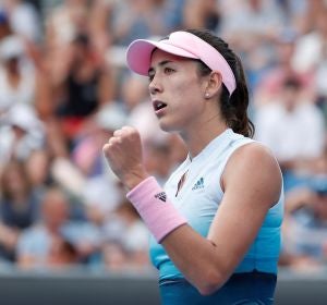 Garbiñe Muguruza celebra un punto en su estreno en el Open de Australia Garbiñe Muguruza celebra un punto en su estreno en el Open de Australia