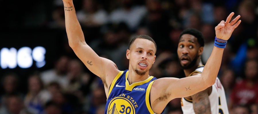 Stephen Curry celebra una canasta ante los Nuggets Stephen Curry celebra una canasta ante los Nuggets