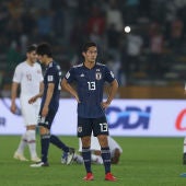 Los jugadores japoneses se lamentan tras la derrota ante Qatar