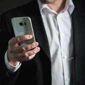 businessman smartphone phone mobile phone busy marketing corporate black 1187227_643x397 businessman smartphone phone mobile phone busy marketing corporate black 1187227_643x397