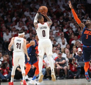 El triplazo de Damian Lillard El triplazo de Damian Lillard
