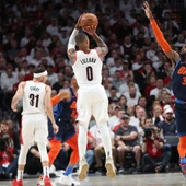 El triplazo de Damian Lillard El triplazo de Damian Lillard