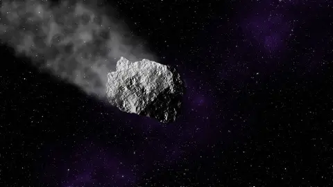 Imagen de archivo de un asteroide en el espacio Imagen de archivo de un asteroide en el espacio