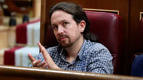 El secretario general de Podemos Pablo Iglesias, en el hemiciclo del Congreso en la primera jornada del debate de investidura El secretario general de Podemos Pablo Iglesias, en el hemiciclo del Congreso en la primera jornada del debate de investidura