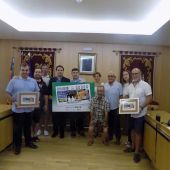 Presentación del cupón de la ONCE ilustrado con motivos de las fiestas de Moros y Cristianos de Aspe.