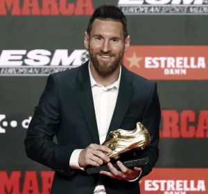 Messi posa con la Bota de Oro Messi posa con la Bota de Oro