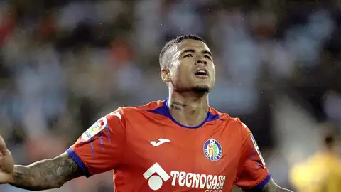 El jugador brasileño del Getafe Robert Kenedy celebra un gol contra el Celta de Vigo, en el partido de la jornada 12 de LaLiga Santander El jugador brasileño del Getafe Robert Kenedy celebra un gol contra el Celta de Vigo, en el partido de la jornada 12 de LaLiga Santander