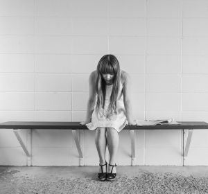 Imagen de archivo de una niña triste Imagen de archivo de una niña triste
