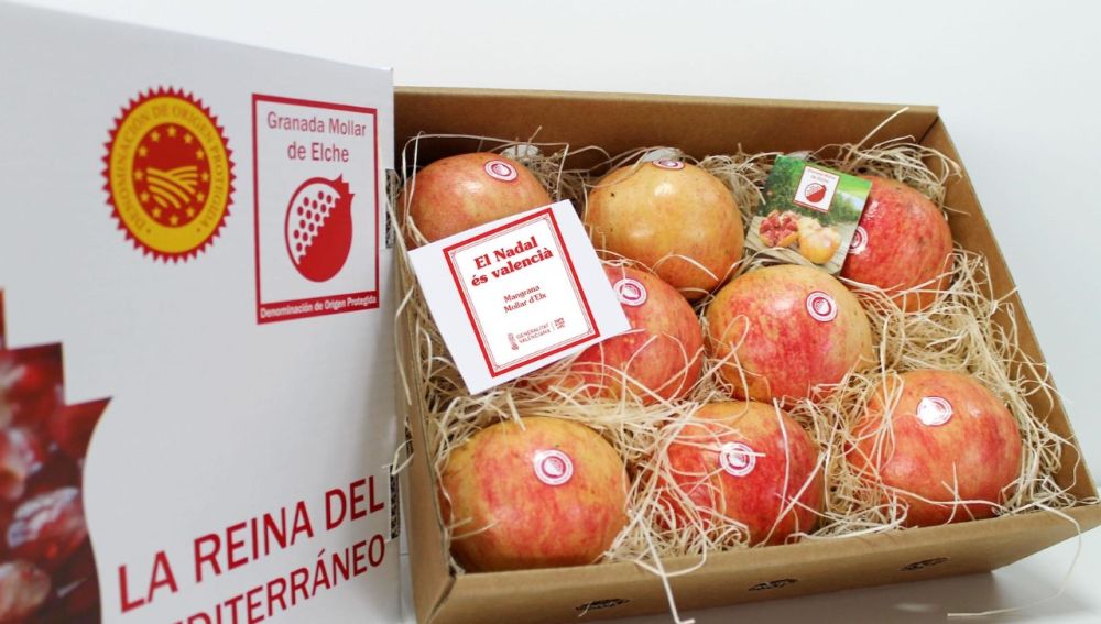 Cajas con granadas Mollar de Elche que se van a enviar desde la DOP.
