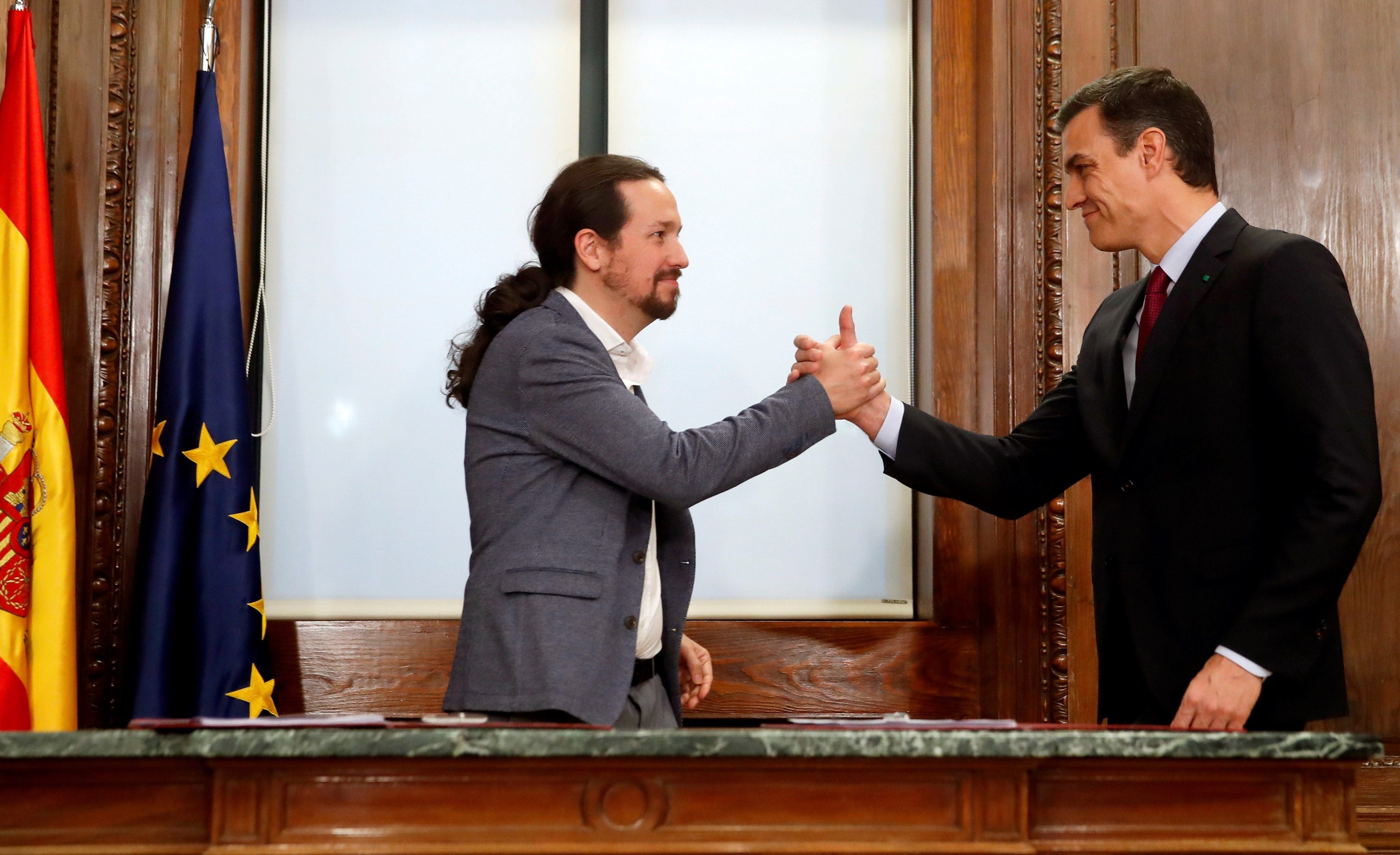 Sánchez e Iglesias sellan el acuerdo de su futuro gobierno de coalición Sánchez e Iglesias sellan el acuerdo de su futuro gobierno de coalición