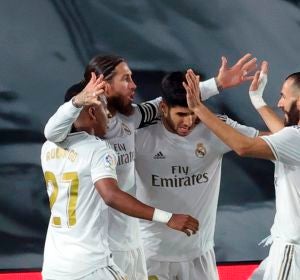 Los futbolistas del Real Madrid celebran un gol Los futbolistas del Real Madrid celebran un gol