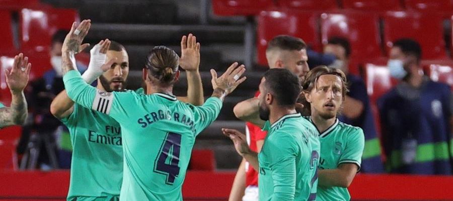 Los futbolistas del Real Madrid celebran un gol. Los futbolistas del Real Madrid celebran un gol.