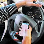 Móvil al volante Móvil al volante