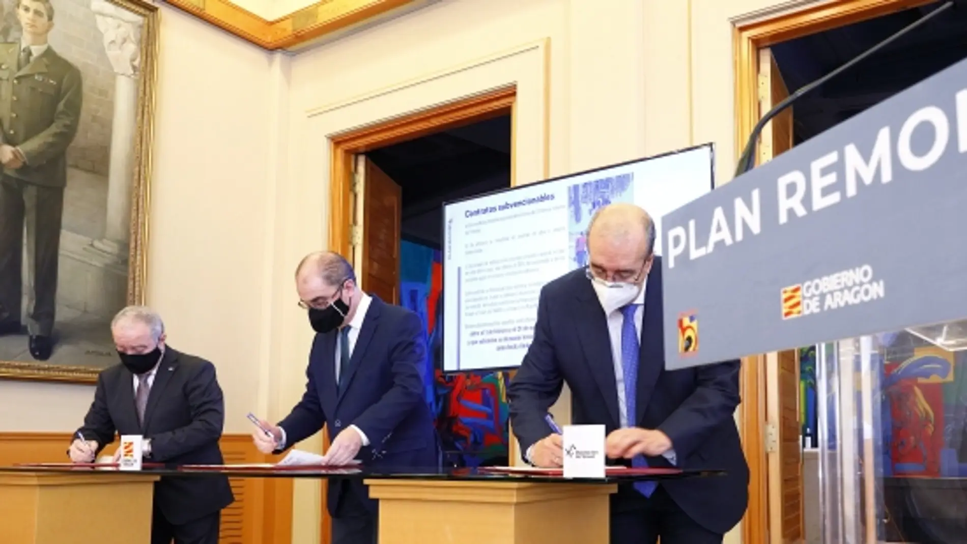 Gracia, Lambán y Rando en el momento de firma del protocolo