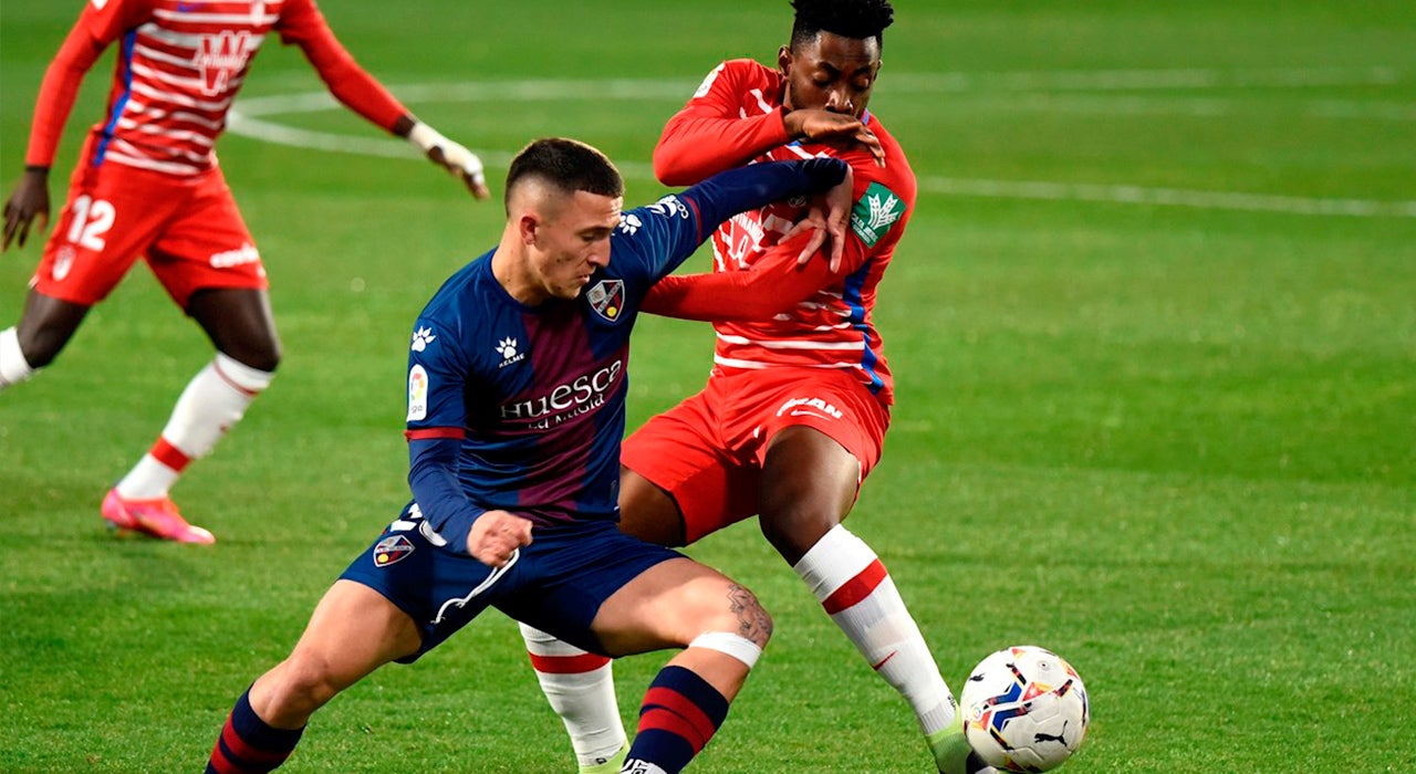 Huesca 3 - 2 Granada: Escriche, Pulido y Foulquier dan la victoria al Huesca en El Alcoraz Huesca 3 - 2 Granada: Escriche, Pulido y Foulquier dan la victoria al Huesca en El Alcoraz