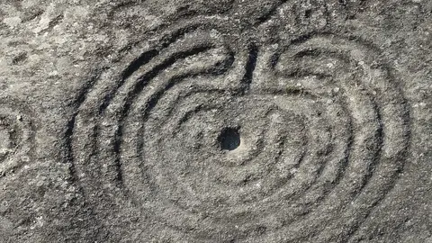 Petroglifos de Mogor Petroglifos de Mogor