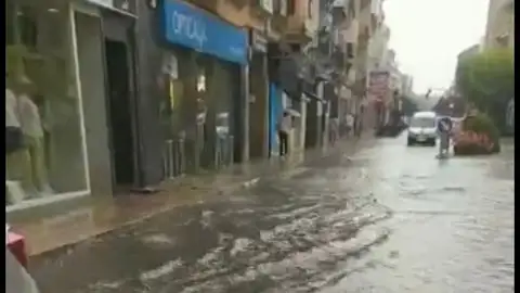 Calle principal inundada Calle principal inundada