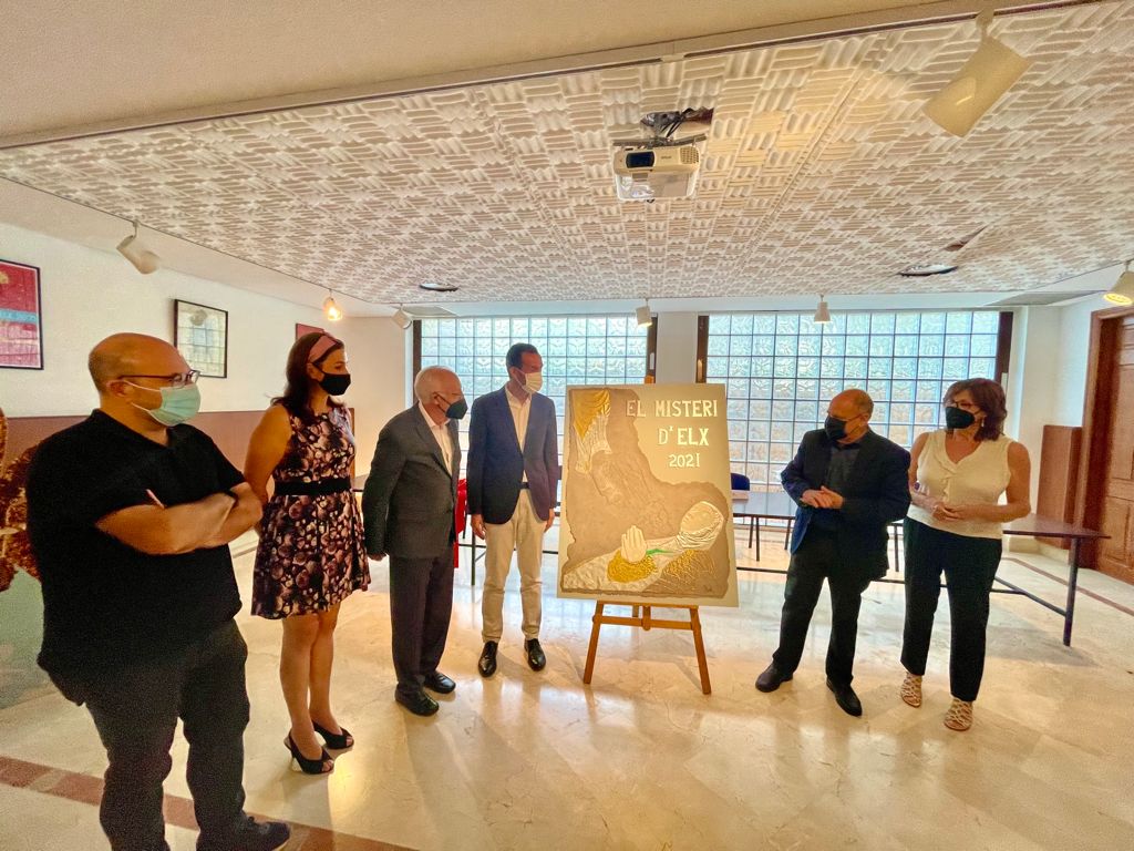 Las manos de Dios y el alma de la Virgen de la Asunción en su ascenso al cielo anuncian el Misteri d’Elx de 2021 Las manos de Dios y el alma de la Virgen de la Asunción en su ascenso al cielo anuncian el Misteri d’Elx de 2021