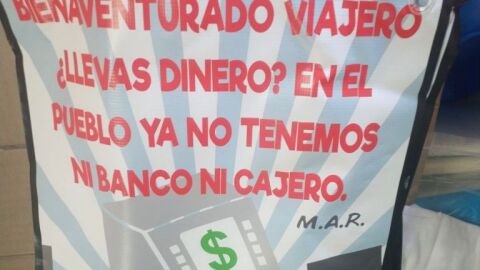 Pancarta colocada en los municipios en los que han retirado las entidades bancarias