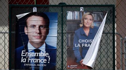 Carteles electorales de Macron y Le Pen / Efe