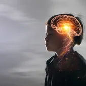 Niño con los ojos cerrados y un gráfico de su cerebro Niño con los ojos cerrados y un gráfico de su cerebro