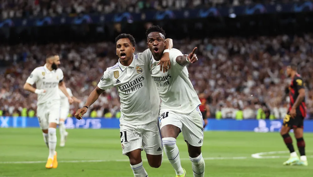 Vinicius celebra junto a Rodrygo su gol en la semifinal de Champions ante el Manchester City