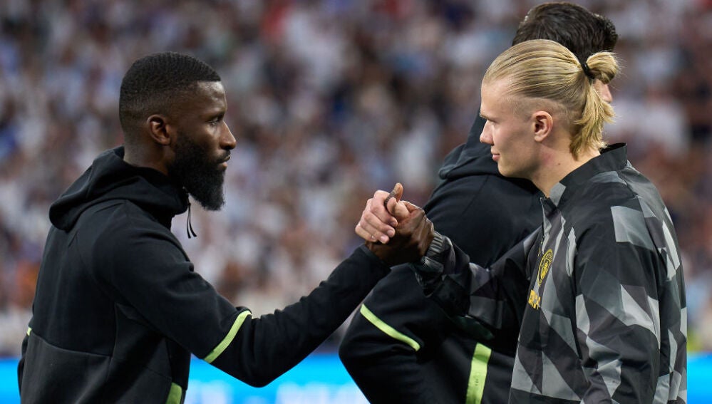 Rudiger y Haaland antes del partido de semifinales de Champions en el Santiago Bernabéu