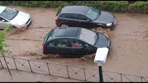 Calle inundada por el agua en Puertollano