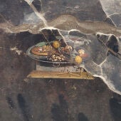 Imagen del fresco encontrado en Pompeya donde aparece lo que podría ser un plato antepasado de la actual pizza