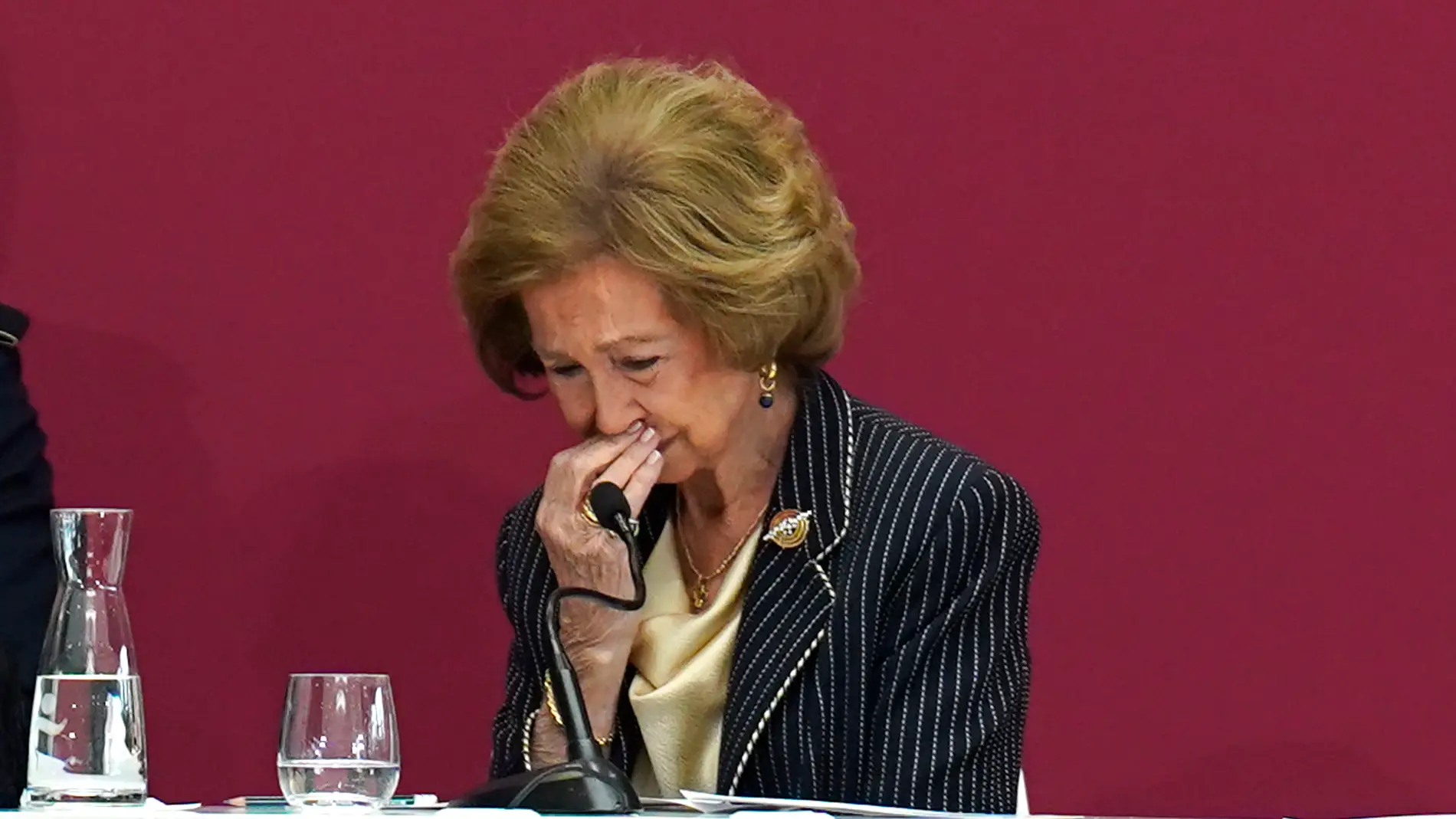 La Reina Sofía se emociona durante el acto en el que se ha nombrado a Emilio Lora-Tamayo como rector honorario de la Universidad Camilo José Cela, a 27 de octubre de 2023