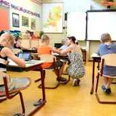 Niños en clase | Imagen de archivo Niños en clase | Imagen de archivo