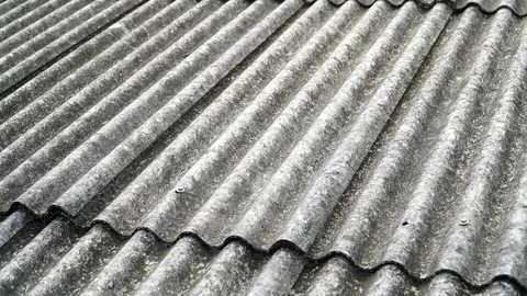 Una coberta d'amiant Una coberta d'amiant