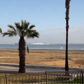 La playa de La Cachucha en una foto de archivo La playa de La Cachucha en una foto de archivo