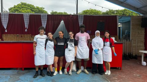 Estudiantes ceut&iacute;es trabajando en la caseta de la Feria 'Las Ca&ntilde;as'