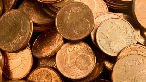 Monedas de 1 y 2 céntimos. Foto de archivo Monedas de 1 y 2 céntimos. Foto de archivo