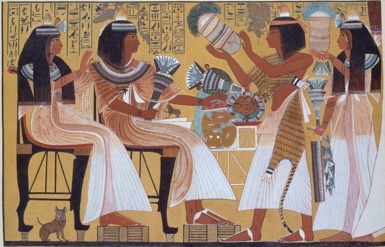 Escena familar representada en un grabado del antiguo Egipto Escena familar representada en un grabado del antiguo Egipto