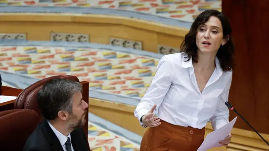 La presidenta de la Comunidad de Madrid, Isabel Díaz Ayuso, interviene durante el pleno de la Asamblea de Madrid. La presidenta de la Comunidad de Madrid, Isabel Díaz Ayuso, interviene durante el pleno de la Asamblea de Madrid.