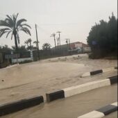 Zona anegada en la carretera Elche-Santa Pola durante una tormenta.