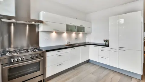 Una cocina de una casa Una cocina de una casa