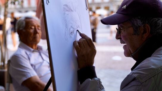 Miguel &Aacute;ngel, caricaturista de la Plaza Mayor. PP.