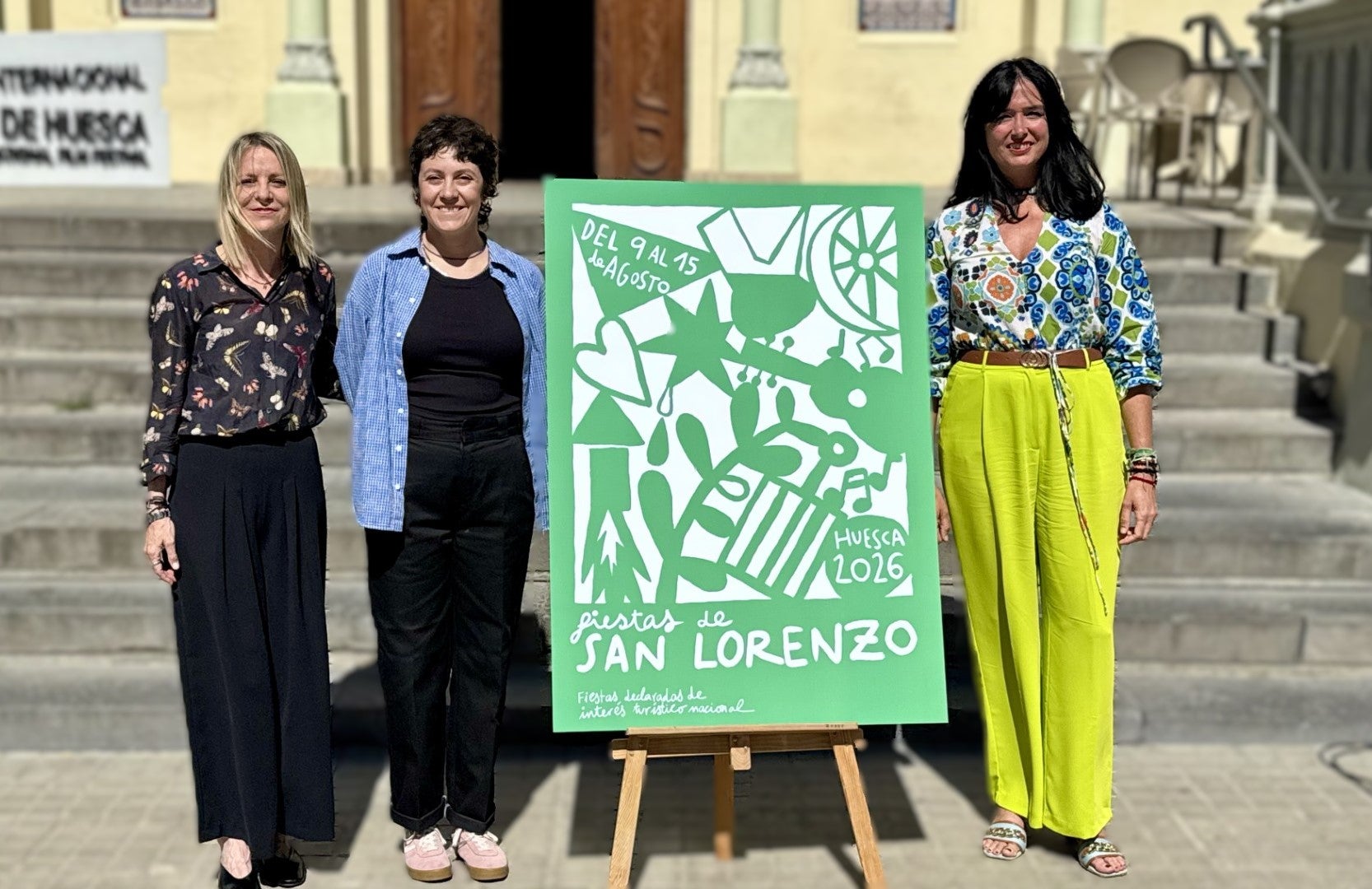 El blanco y verde y una docena de símbolos laurentinos protagonizan el cartel de las fiestas de Huesca El blanco y verde y una docena de símbolos laurentinos protagonizan el cartel de las fiestas de Huesca
