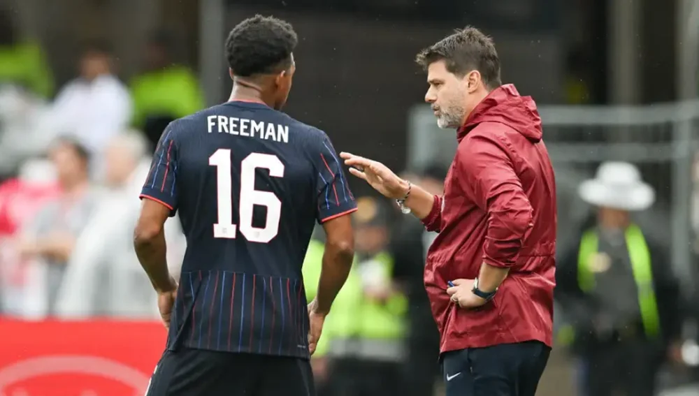 Freeman junto a Mauricio Pochettino Freeman junto a Mauricio Pochettino