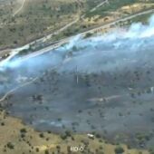 Un incendio forestal en Lozoyuela (Madrid) obliga a desalojar una urbanización en la Sierra y cortar la A1