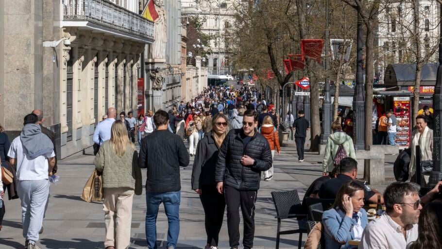 People seen walking along the sidewalks of Gran Via Street located in downtown. Madrid is a city renowned for its historical heritage, vibrant tourism scene, and diversity establishing it as one of the continent's leading cities.