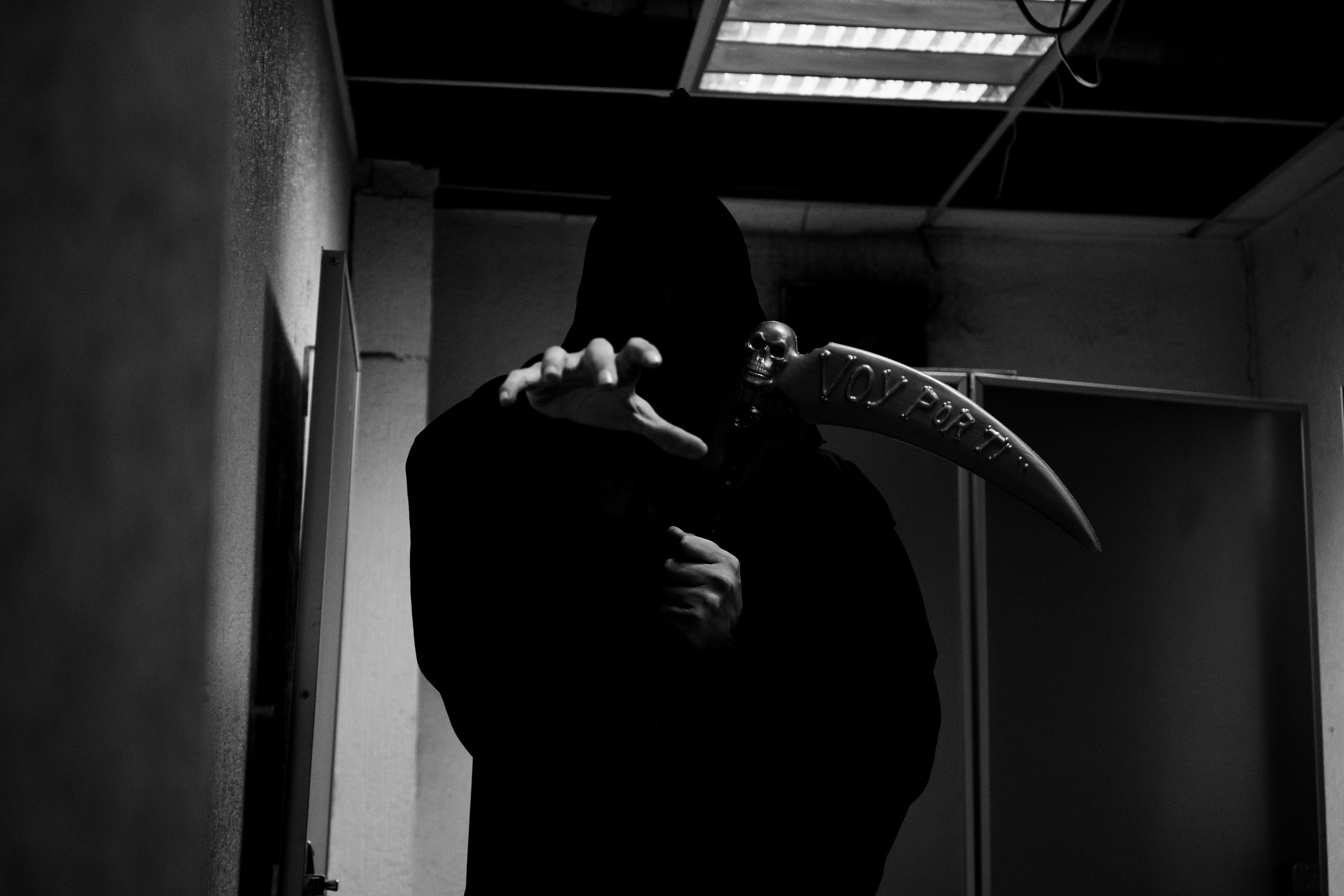 Persona disfrazada de la Muerte. Imagen de archivo. Persona disfrazada de la Muerte. Imagen de archivo.