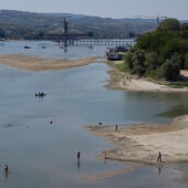 A changed shoreline at Strand Beach on the Danube River following a drop in water levels during hot weather in Novi Sad, Serbia, on August 4, 2026. 