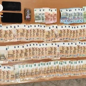 Dinero incautado durante la detención Dinero incautado durante la detención
