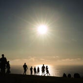People visit Monte de San Pedro park, where thousands of people are expected to gather for the August 12th total solar eclipse, on August 10, 2026 in A Coruna, Spain.